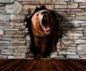 3D Бурый медведь ревёт на фоне каменной стены