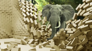 Слон на фоне 3D кирпичной стены